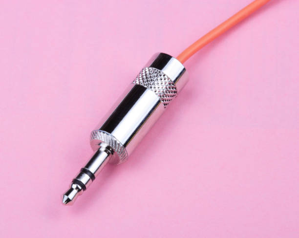 istock Stereo Male Plug Connector on Pink Background 1138204120