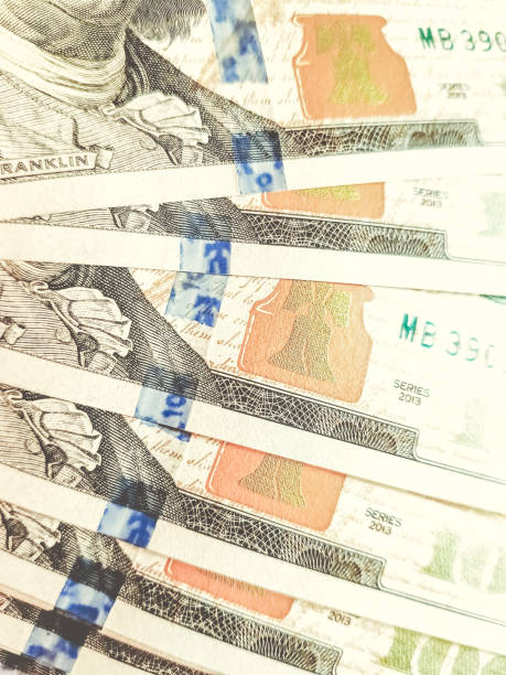 istock One hundred dollar bills macro shot background. 1138209885