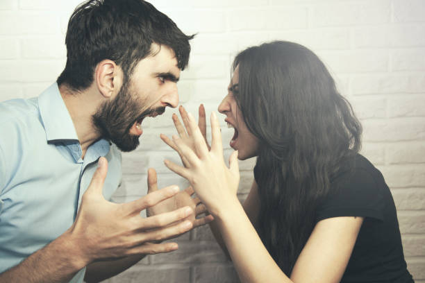 istock woman and man in fight 1138210294