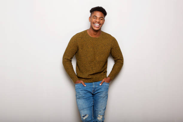 istock relaxed young black man smiling against gray background 1138213167