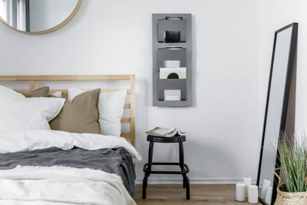 istock Cozy bedroom with wooden bed 1138215828