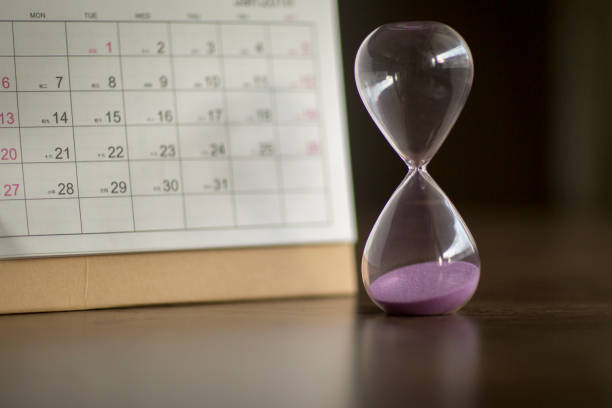 istock Hourglass and calendar 1138216382