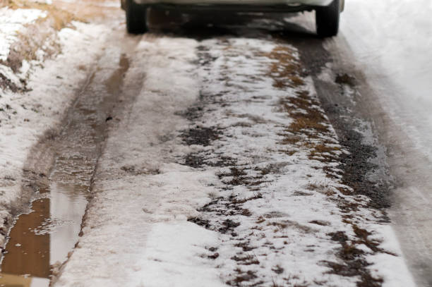 istock Bad road with snow and mud 1138216546