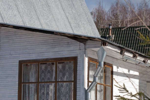 istock wooden house painted in grey 1138216569