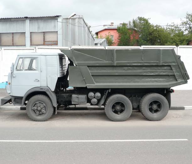 istock grey truck on road 1138216571