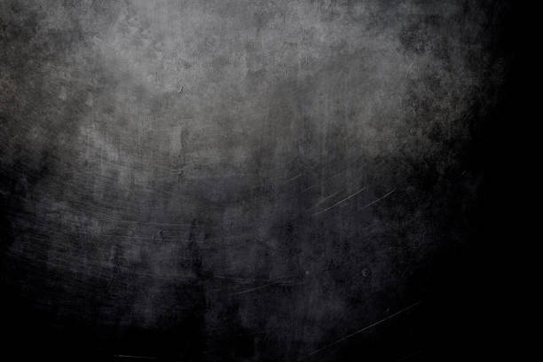 istock dark grungy background with spotlight background 1138216826