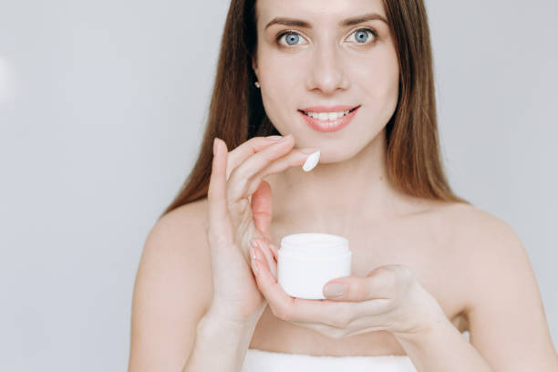 istock big lips smile cream face skin finger 1138219749