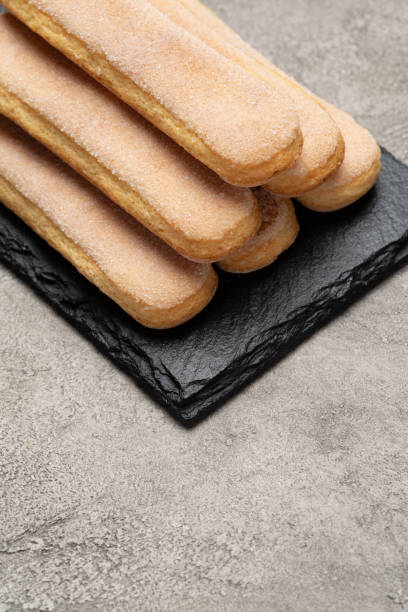 istock Italian Savoiardi ladyfingers Biscuits on concrete backgound 1138221464