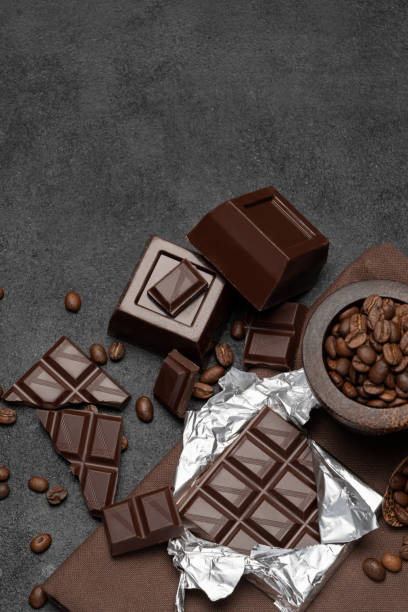 istock dark organic chocolate and coffee beans on concrete background 1138221466