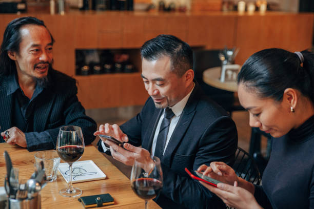 istock Business people sitting in restaurant 1138223653