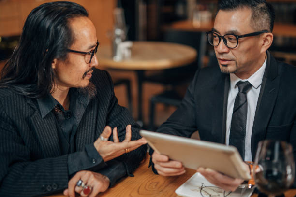 istock Business people in restaurant 1138225419