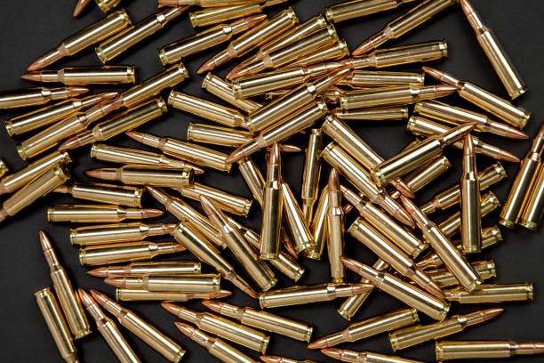 istock Rifle cartridges on a black background 1138227998