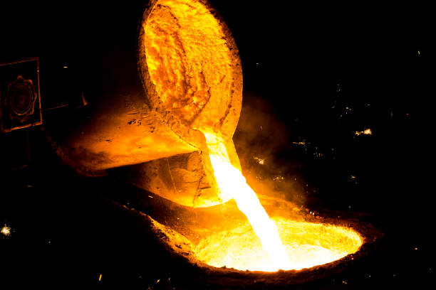 istock metal casting process with red high temperature fire in metal part factory 1138228204