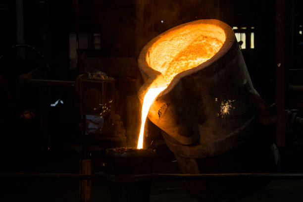 istock metal casting process with red high temperature fire in metal part factory 1138228208