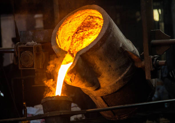 istock metal casting process with red high temperature fire in metal part factory 1138228209