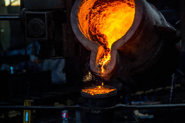 istock metal casting process with red high temperature fire in metal part factory 1138228218