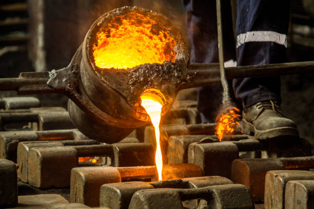 istock metal casting process with red high temperature fire in metal part factory 1138228222