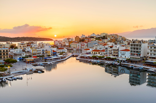 Agios Nikolaos, Greece - April 19, 2017: Morning view of Agios Nikolaos and its harbor, Crete, Greece. \