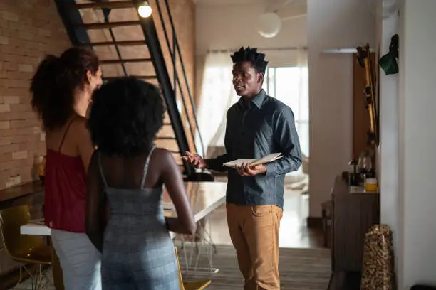 Photo of Real estate agent showing a property to consumers