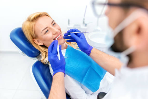 istock Woman having teeth examined at dentists 1138231663