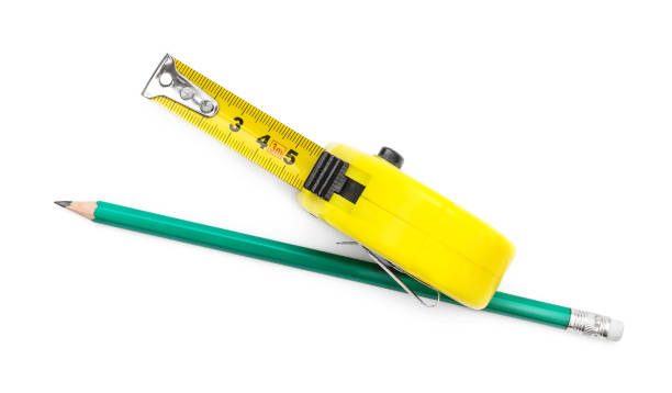 istock Measuring tape tool with pencil on white background. Top view. 1138231717