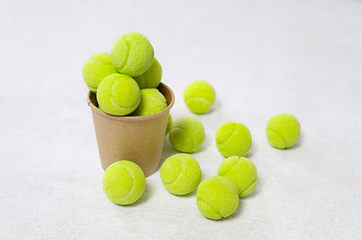 Tennis balls background gumballs on white background