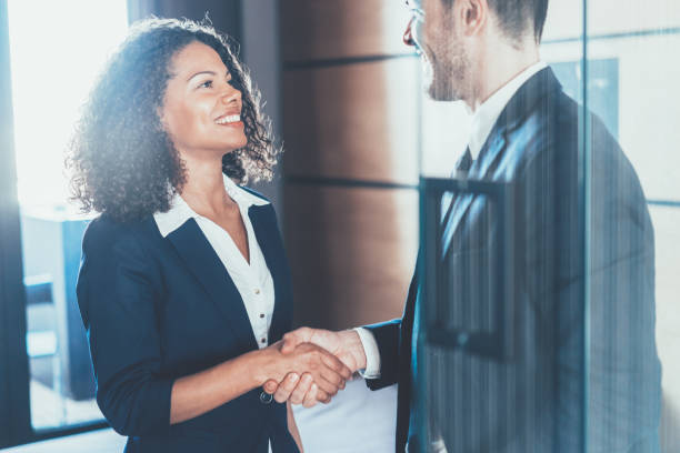 istock Business people shaking hands 1138233826