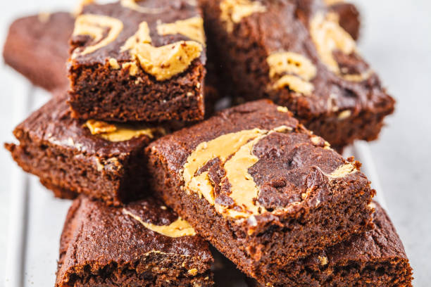 istock Vegan brownie with peanut butter on white background. 1138234120