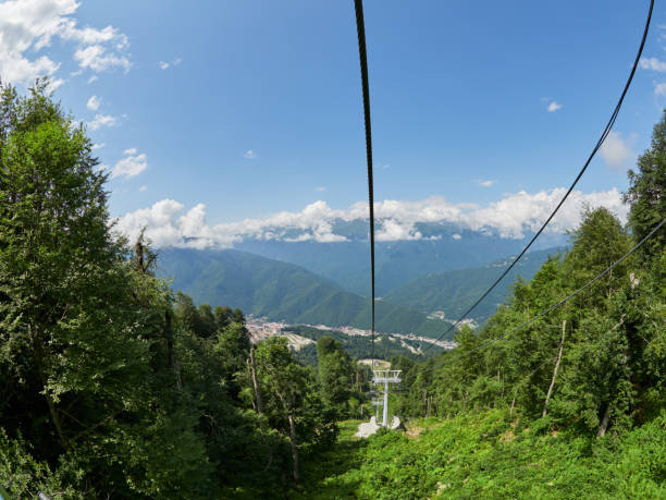 istock The cable car descends along the green mountain slope 1138234549