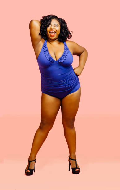 full body portrait of a beautiful plus size model in bathing suit - sex symbol sensuality women overweight imagens e fotografias de stock