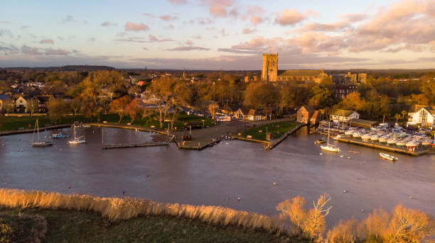 istock Aerial town view along a river at golden hour 1138235781