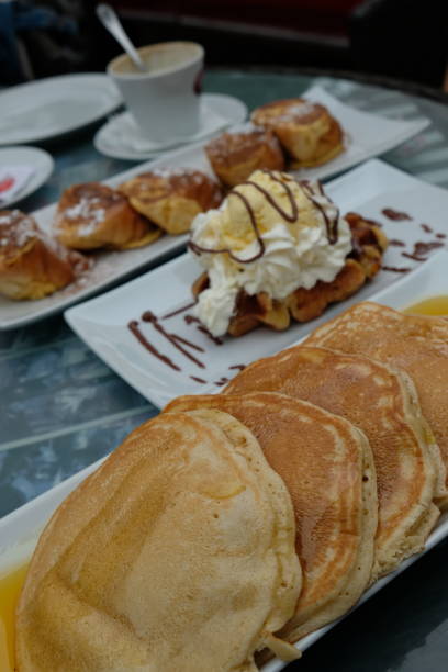 istock Pancakes and other breakfast sweets on background 1138235944