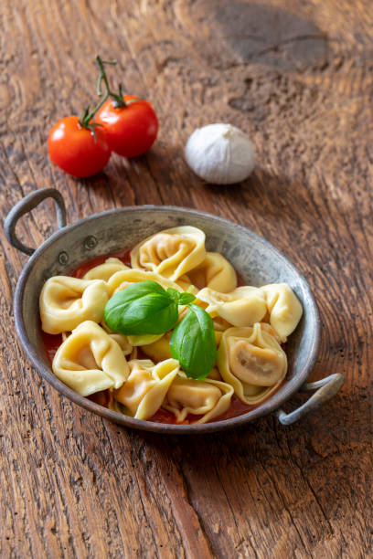 istock tortellini on wood with tomato sauce 1138236091
