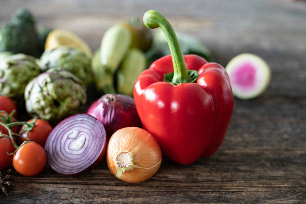 istock Many vegetables on the rustic wooden table. 1138238840