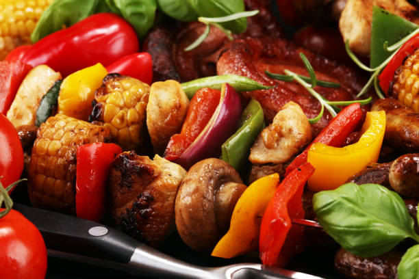 istock Assorted delicious grilled meat and skewer with vegetable on rustic table 1138239098