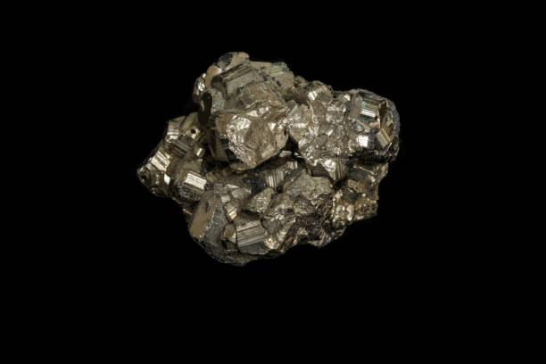 istock Macro mineral stone Pyrite on a black background 1138243025