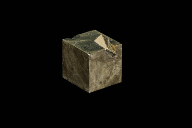 istock Macro mineral stone Pyrite on a black background 1138243159