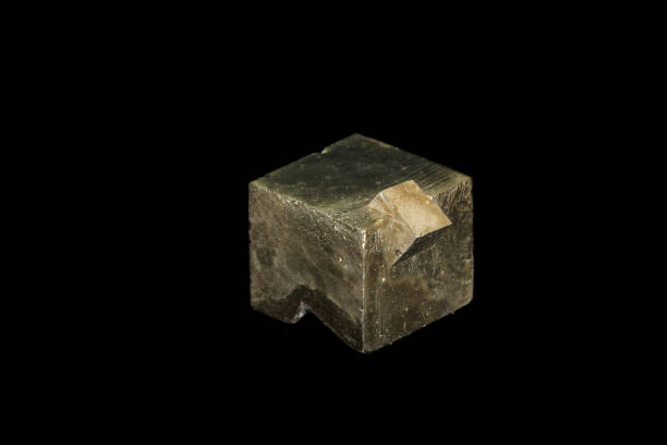 istock Macro mineral stone Pyrite on a black background 1138243819