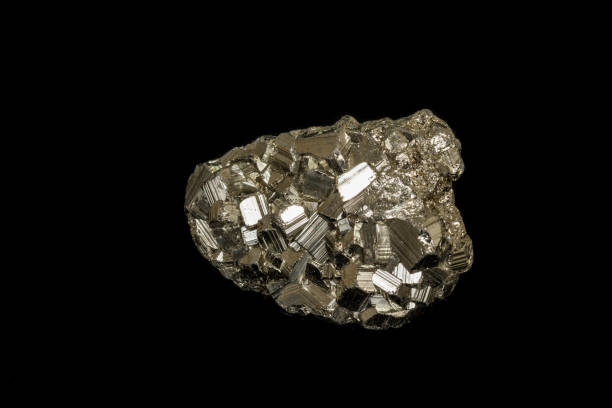 istock Macro mineral stone Pyrite on a black background 1138243883