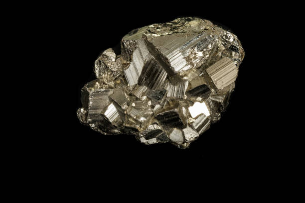 istock Macro mineral stone Pyrite on a black background 1138244003