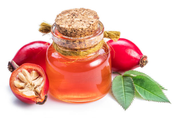istock Rose-hips and rosehip seed oil. 1138245970