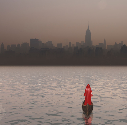 Figure in red cloak in a boat. Cityscape of New York.