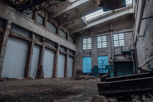 istock Abandoned factory interior. Empty industrial hall of workshop 1138247042