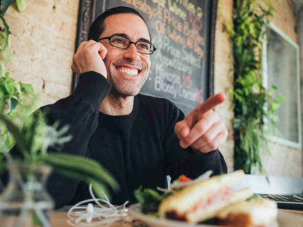 istock Caucasian man having a coffee at the small bistro 1138248836