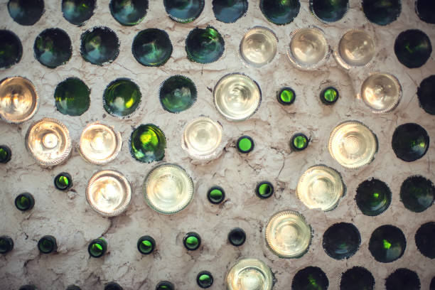 istock Glass bottles inside the wall background, abstract texture 1138250053