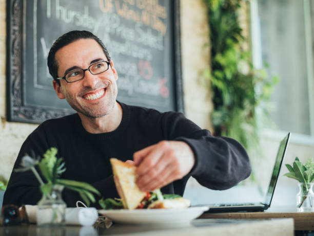 istock Caucasian man having a break at the small bistro 1138250153