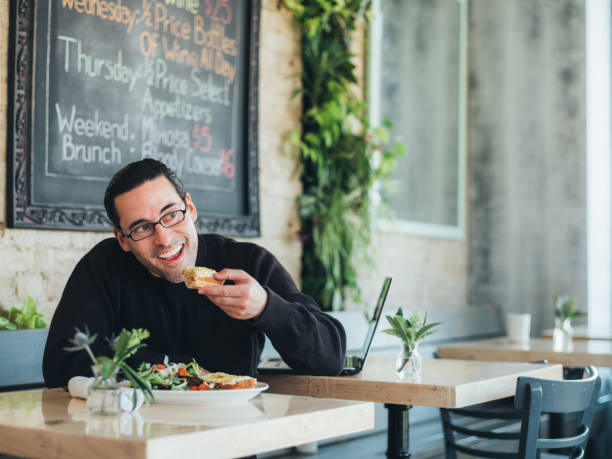 istock Caucasian man having a break at the small bistro 1138250184