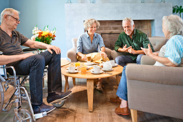 istock Senior friends having breakfast at nursing home 1138250428