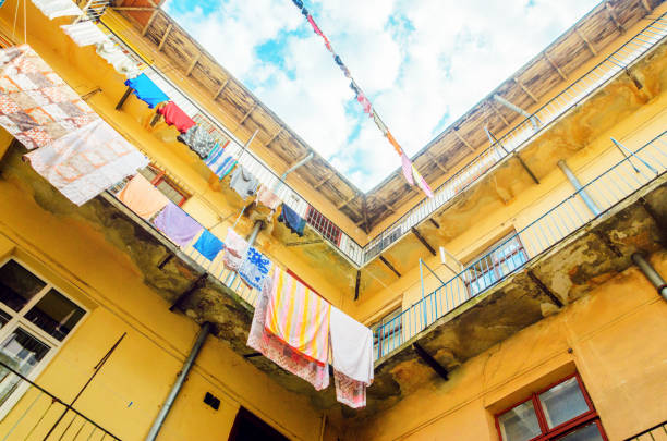 istock Linen is Dried on Clothesline in the Yard-Well 1138252188