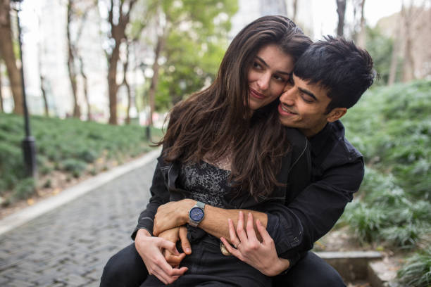 istock Couple hugging at the park 1138254860